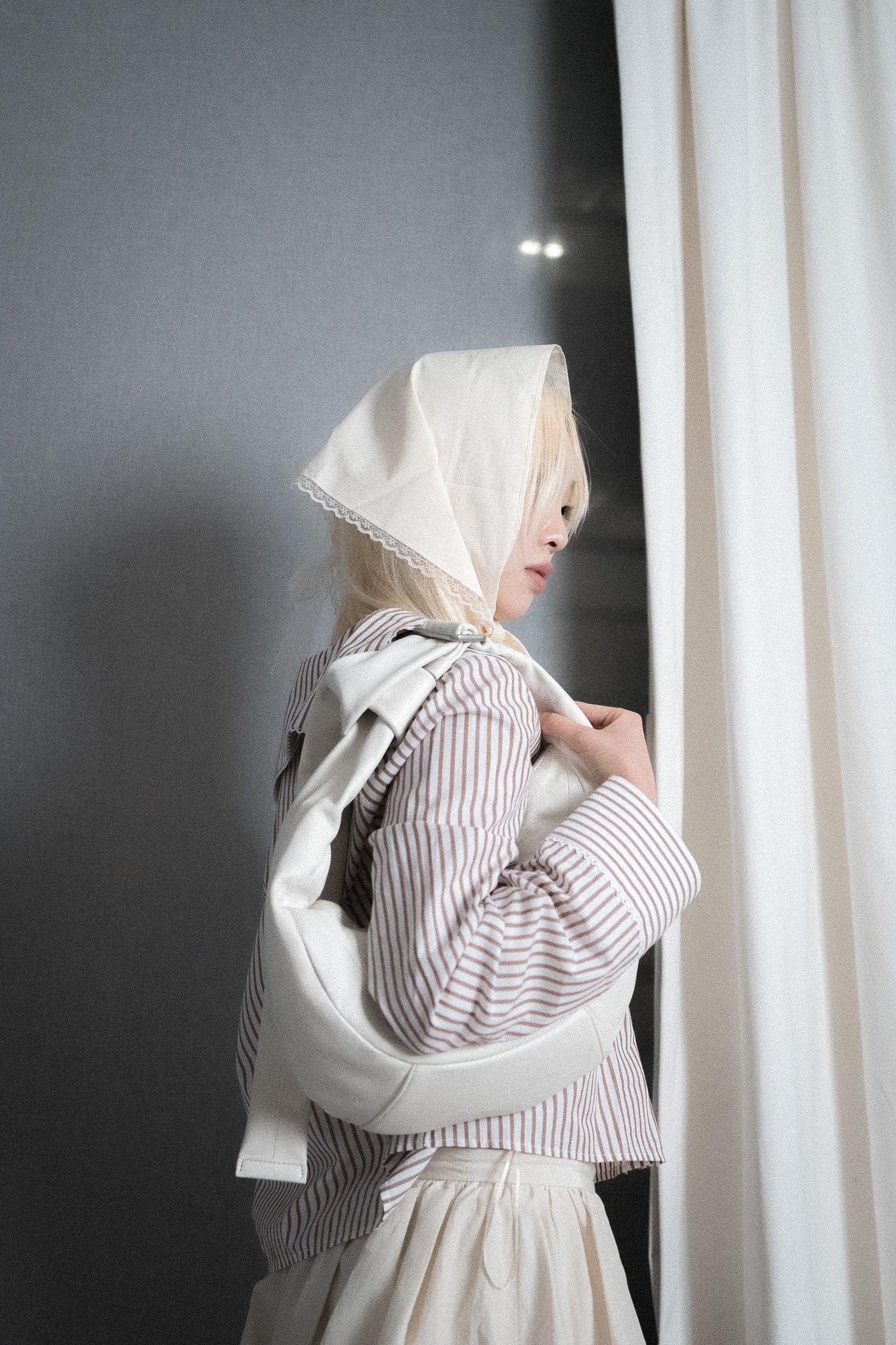 Knotted Crescent Hobo Bag With Buckles