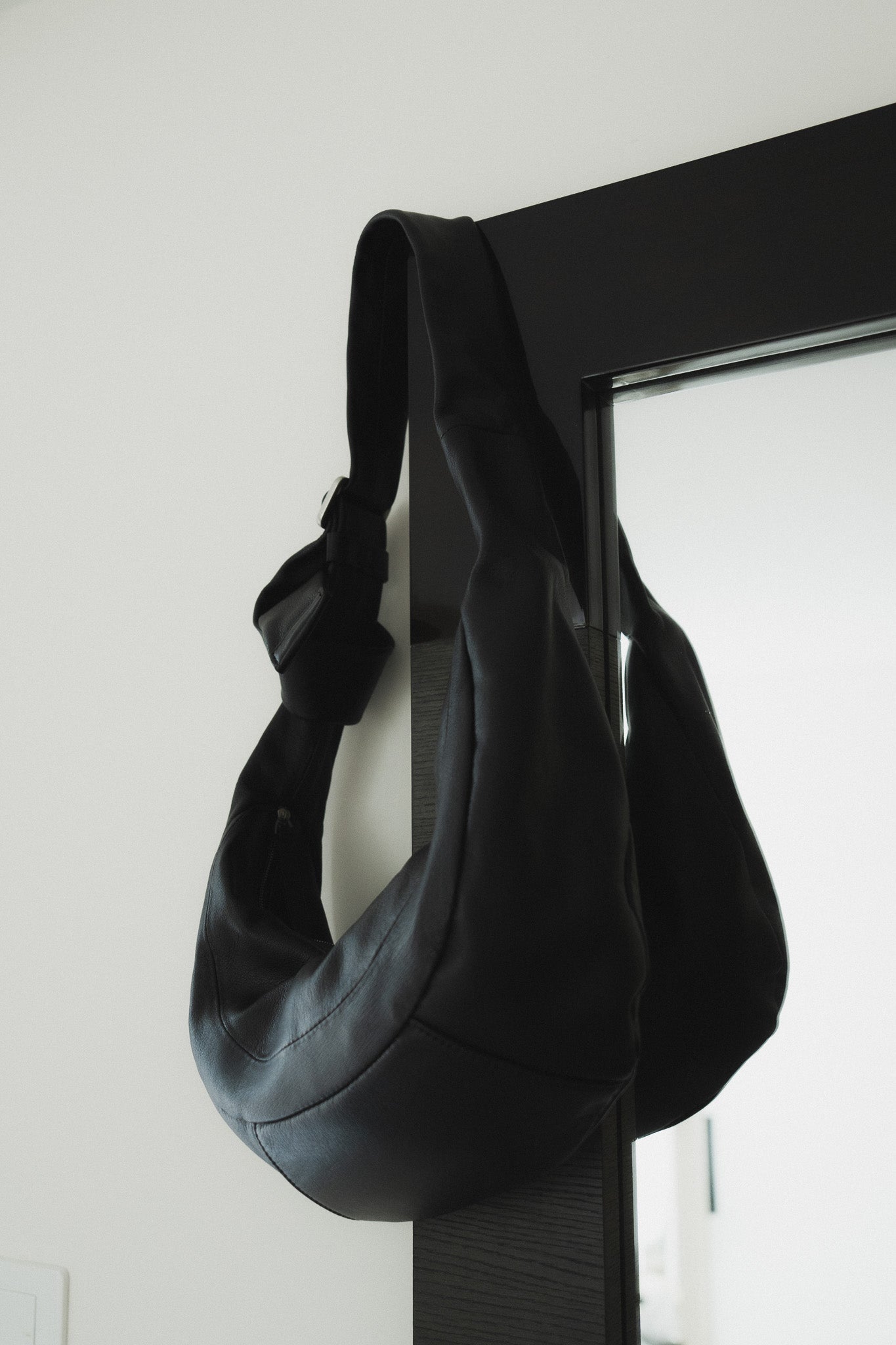 Knotted Crescent Hobo Bag With Buckles