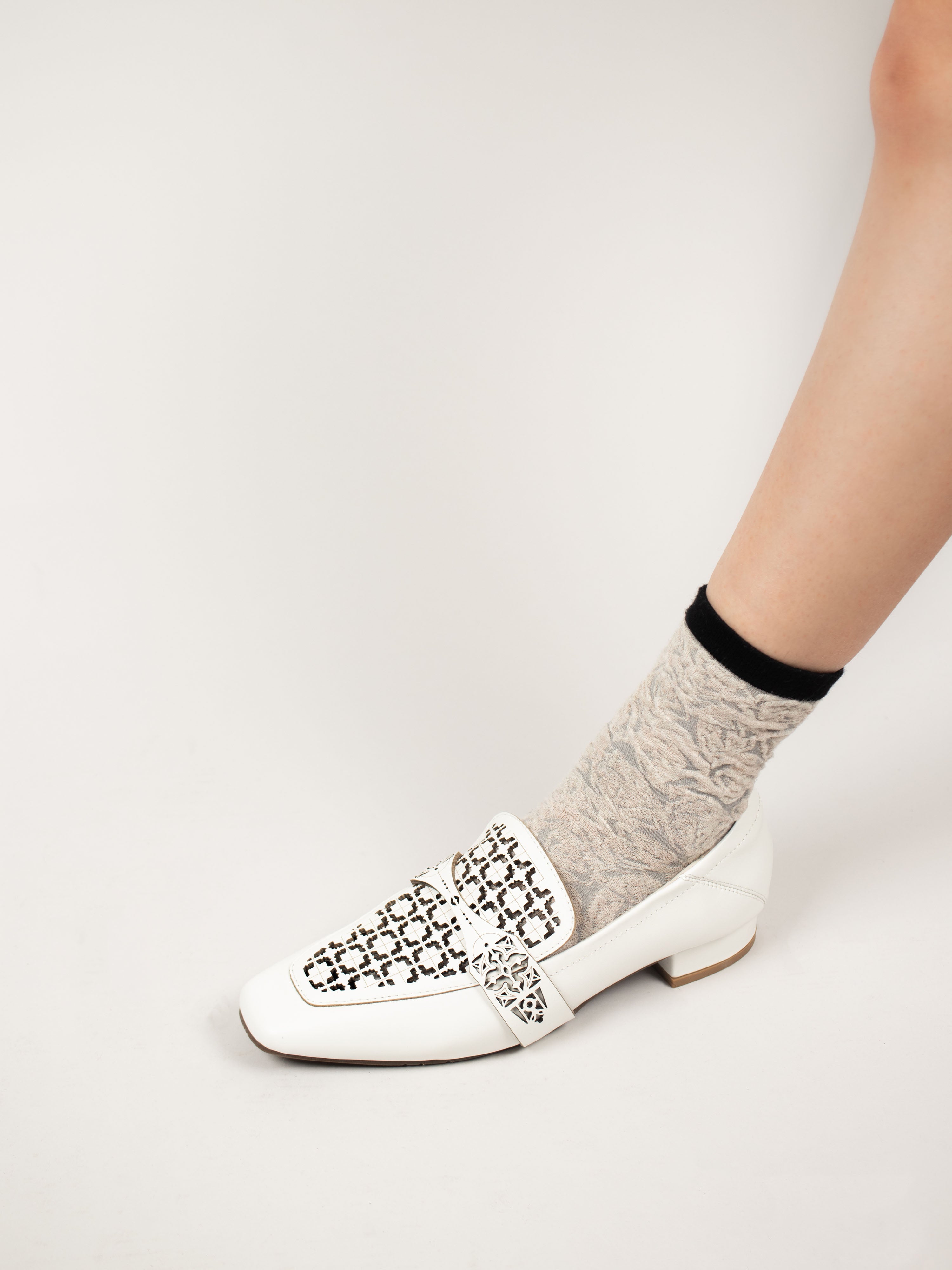 Almond-Toe Laser-Cut Loafers