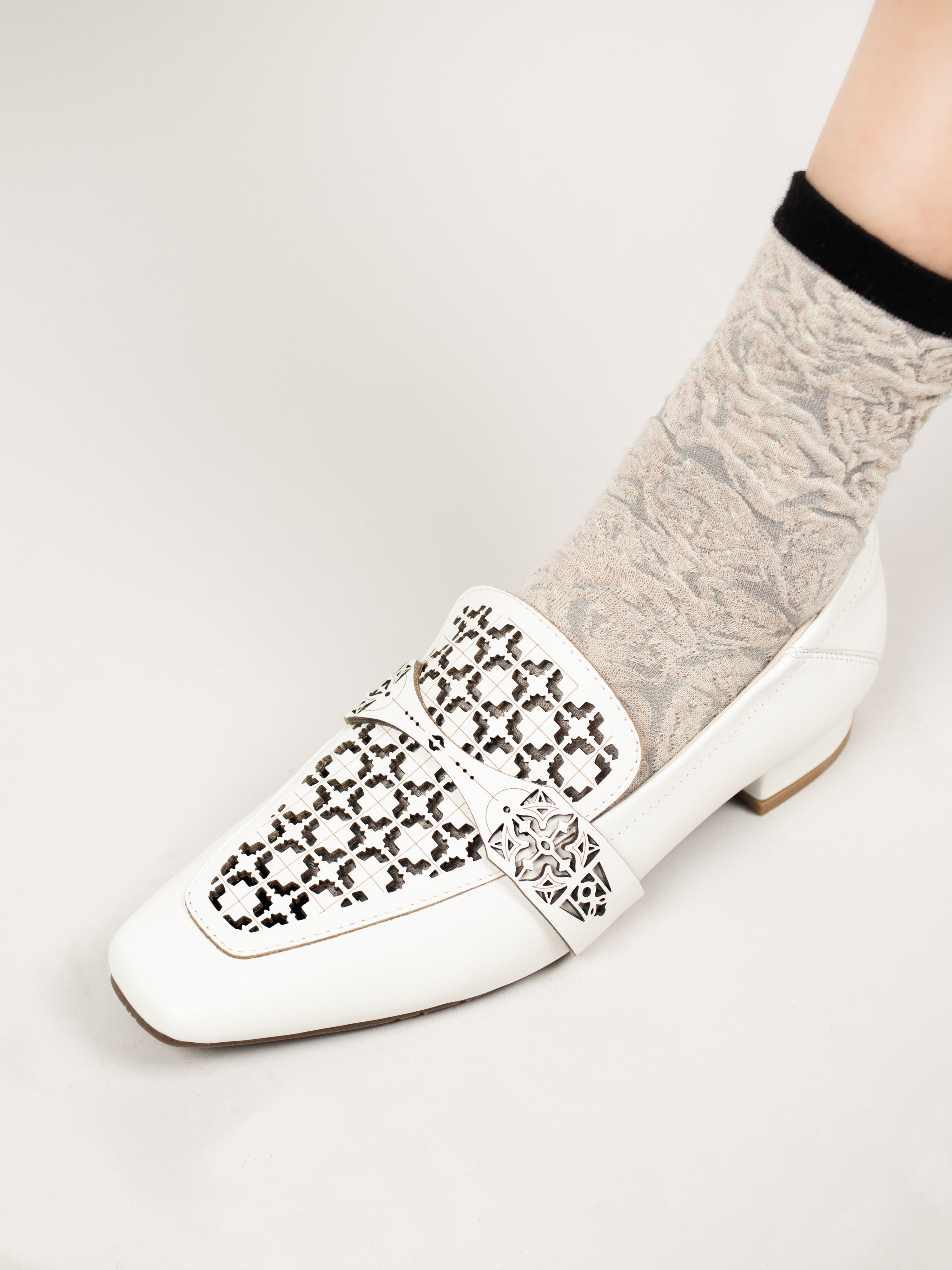 Almond-Toe Laser-Cut Loafers