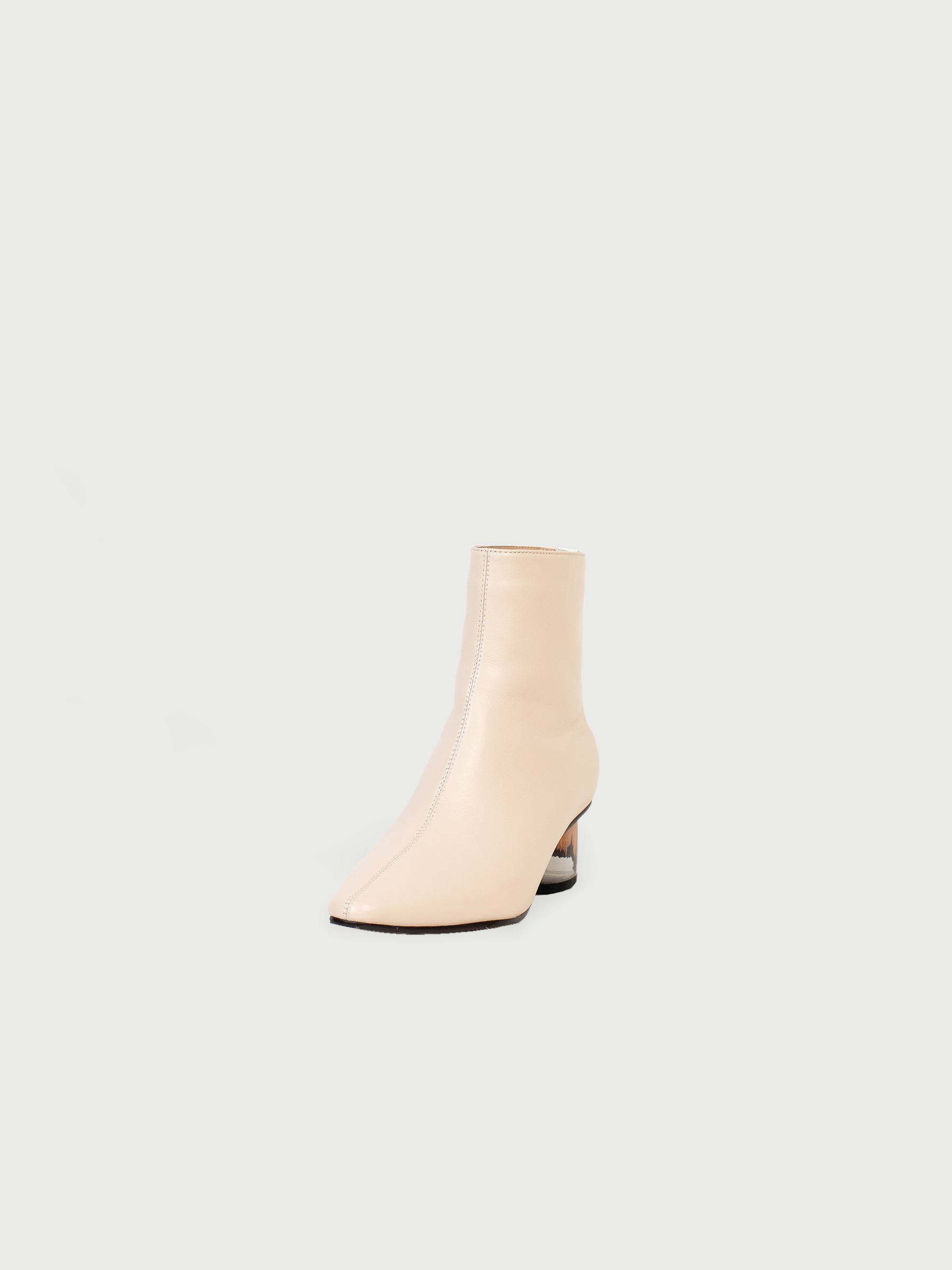 Pointed-Toe Stitched Boots with Ground-Heel